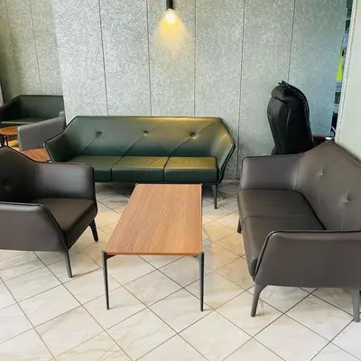 a couch and two chairs in a waiting room at Hotel Oz Villa in Istanbul