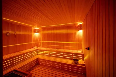 a wooden sauna with lights on the side of it at Vess Hotel in Istanbul