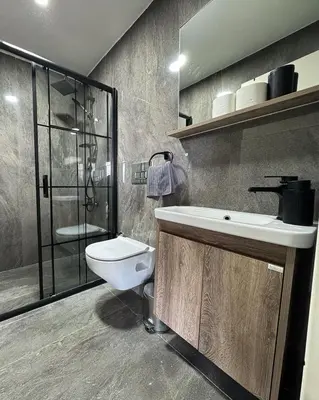 a bathroom with a toilet and a sink and a shower at PANA Sapanca Lake View in Sapanca