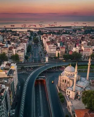 a city with a bridge over a street with traffic at Falay Hotel Yavuz in Istanbul