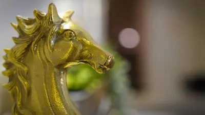 a gold horse statuette of a horse head at Gaia Suites Istanbul in Istanbul