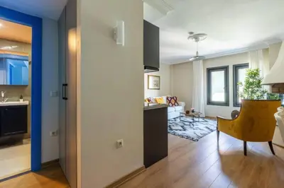 a room with a kitchen and a living room at Stunning Bosphorus 2BD2Bath Views Terrace! #357 in Istanbul