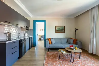 a kitchen and living room with a couch and a table at Gorgeous Airy 2BD2Bath Bosphorus Views! #358 in Istanbul