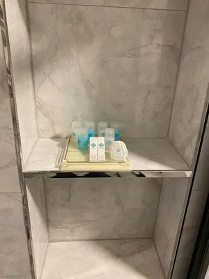 a refrigerator with some items on a shelf at By Otel Nilüfer in Bursa