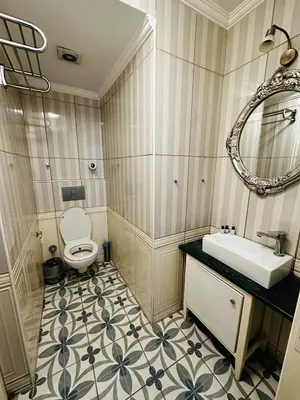 a bathroom with a sink and a toilet at Istanbul Allyon Hotel Taxim City Center in Istanbul