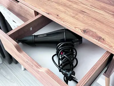 a hair dryer is hanging from a table at Bro Apartments Sultanahmet in Istanbul