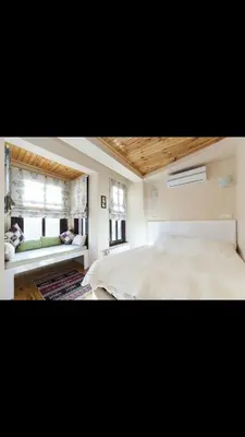 a bedroom with a white bed and a window at Hotel No 34 in Istanbul