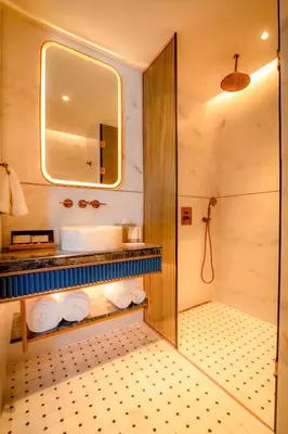 a bathroom with a sink and a mirror at Sura Concept Hotel in Istanbul