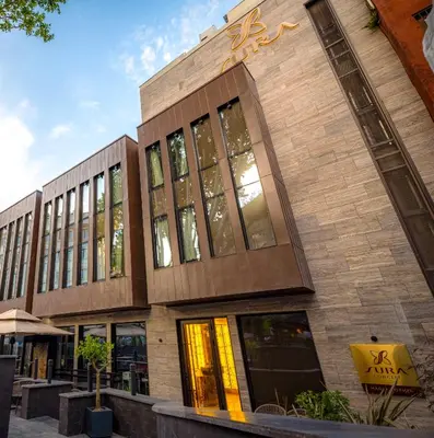 a building with a sign on the side of it at Sura Concept Hotel in Istanbul