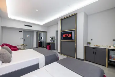 a hotel room with a bed and a television at 216 Prestige Hotel in Istanbul