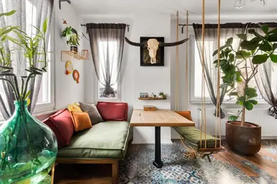 a living room with a couch and a table at Panoramic Sea View Loft with Terrace BBQ in Istanbul