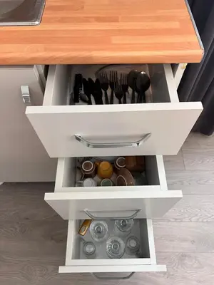 a drawer in a kitchen with a wooden table at Galata studio in Istanbul