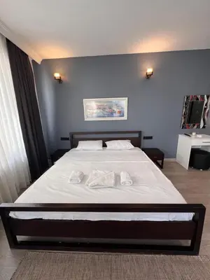 a bedroom with a large bed with towels on it at Galata studio in Istanbul