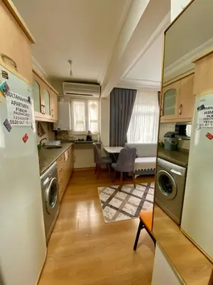 a kitchen with a washer and dryer at Sultanahmet Apartment in Istanbul