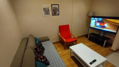 a living room with a couch and a tv at Luxury Residence in Taksim in Istanbul