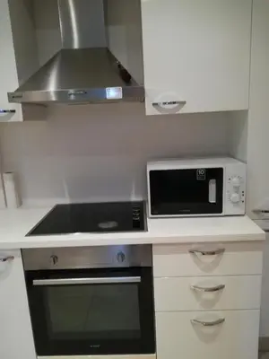 a kitchen with a stove and a microwave at Luxury Residence in Taksim in Istanbul