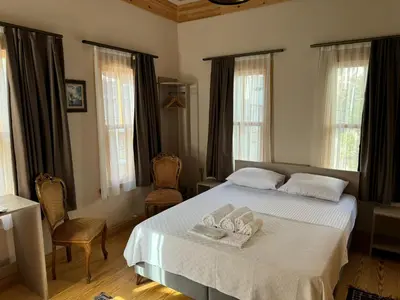 a bedroom with a bed with two towels on it at HanFlats in Istanbul