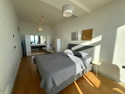 a bedroom with a large bed in a room at Modern Luxury apt at Sinpas Queen in Istanbul