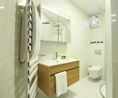 a bathroom with a sink and a toilet at Excellent Apartments Fatih Serenity in Istanbul