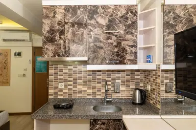 a kitchen with a sink and a counter top at taksim terra suit 2 in Istanbul