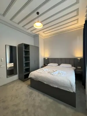 a bedroom with a large bed in a room at Lighthouse in Istanbul