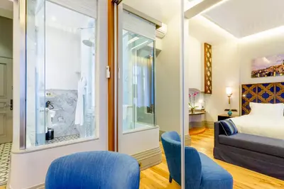 a hotel room with a bed and a window at Ravouna 1906 Bosphorus Istanbul in Istanbul