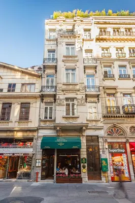 a tall building with a store in front of it at Ravouna 1906 Bosphorus Istanbul in Istanbul
