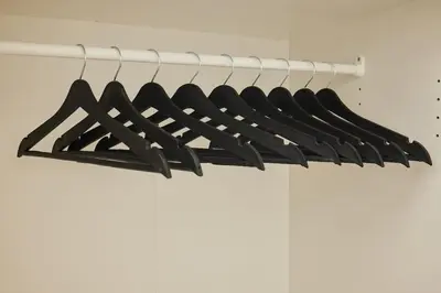 a bunch of black hangers in a closet at Charming 3BR 2Bath AC in Center - Santur D7 in Istanbul