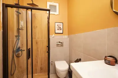 a bathroom with a shower and a toilet and a sink at Charming 3BR 2Bath AC in Center - Santur D7 in Istanbul