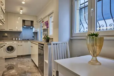 a kitchen with a vase sitting on a counter at Stunning Apartment in Bebek - Manolya8 in Istanbul