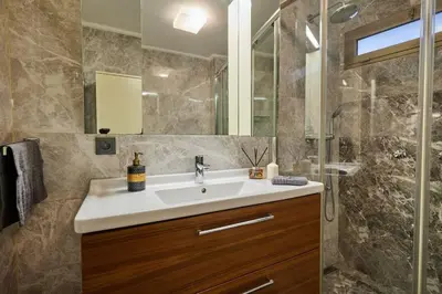 a bathroom with a sink and a shower at Stunning Apartment in Bebek - Manolya8 in Istanbul