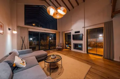 a living room with a couch and a table at Sapanca İnci Suit in Yanık
