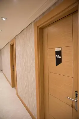 a door in a hallway with a sign on it at XLoft in Istanbul