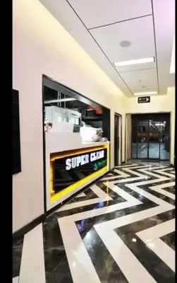 a lobby with a super club sign on the floor at Luxury apt in the 40 plus floor in Istanbul