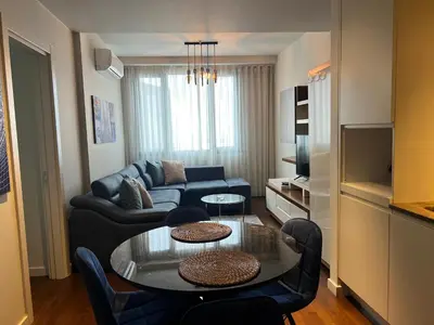 a living room with a couch and a table at ultra lüxs in Istanbul