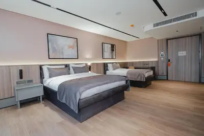 a hotel room with two beds in a room at Romatem Move İstanbul Disabled Hotel in Istanbul