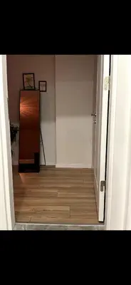 a room with a hallway with a wooden floor at KÖYLÜM RESİDENCE-2 Bostancı in Istanbul