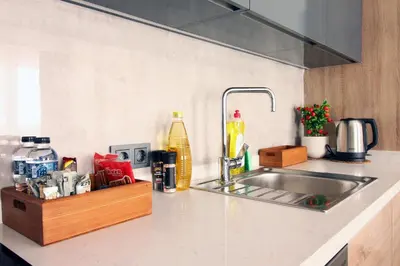 a kitchen counter top with a sink and a counter top at Excellent Apartments Fatih Golden Horn in Istanbul