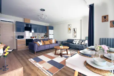 a living room with a couch and a table at Excellent Apartments Fatih Golden Horn in Istanbul