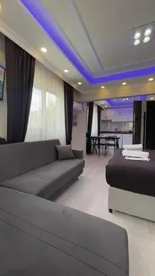 a living room with a couch and a table at Özdemir Apart - Sultanahmet in Istanbul