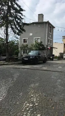 a car parked in front of a house at Özdemir Apart - Sultanahmet in Istanbul