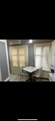 a small room with a table and two chairs at Cosy studio apartment in Istiklal central in Istanbul