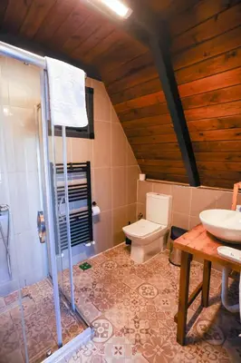 a bathroom with a toilet and a sink at Resort Mola Sapanca in Sapanca