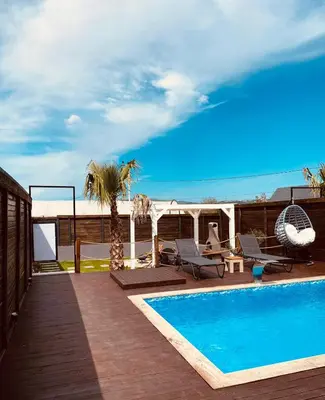 a swimming pool with a view of the ocean at Club Armada Bungalow Hotel Sapanca in Sapanca