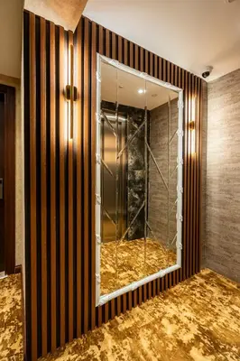 a room with a glass door with a mirror at Old Harbour Hotel istanbul in Istanbul