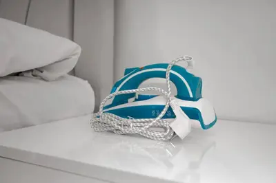 a blue and white purse sitting on a table at Large central apartment in a quiet area 40 in Istanbul