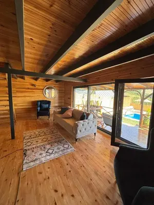 a living room with a couch and a chair at Uysal Dağevleri in Bilecik