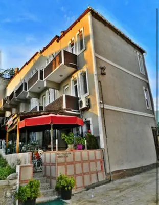 a building with a restaurant in front of it at NO PROBLEM OTEL Pansiyon in Tekirdag