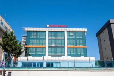 a building with a sign on top of it at The Port Güzelyalı in Pendik