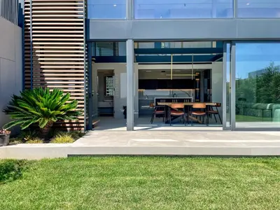 a glass house with a table in front of it at Beykoz Breeze in Beykoz
